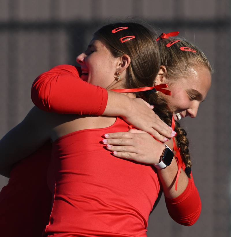 Benet Academy’s Clare Lopatka front, and Shane Delaney celebrate after winning the Class 1A doubles championship match of the girls state tennis tournament at Hersey High School on Saturday, Oct. 26, 2024 in Arlington Heights.