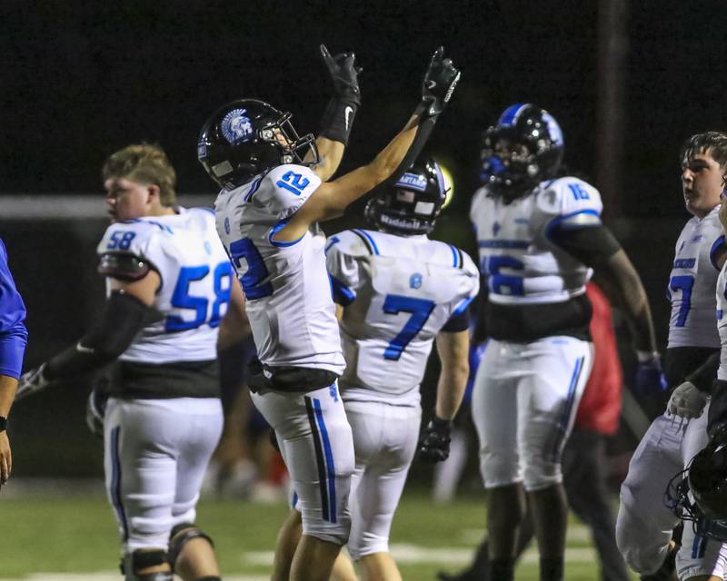 St Francis celebrates the win over Kenwood Academy in their football game on Thursday, Aug 28, 2025  in Chicago.