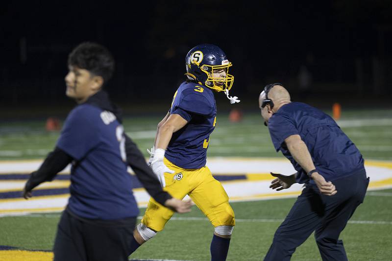 Sterling’s Isaac Ibarra celebrates a Warrior fumble recovery against Quincy Friday, Oct. 17, 2025.