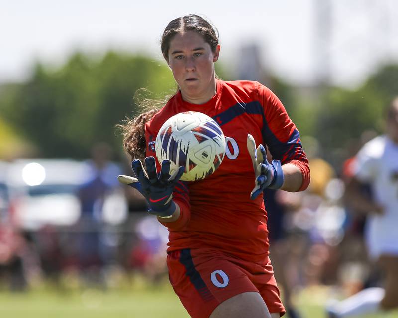 Oswego's Kyla Baier (0) looks in a save during Class 3A regional final soccer match between Neuqua Valley at Oswego on Saturday, May 23, 2026 in Oswego.
