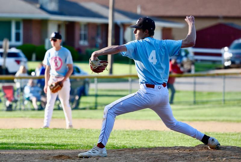 Hall's Luke Bryant fires a pitch in the seventh inning of the Red Devils' 4-1 win over Princeton at Kirby Park on Thursday.