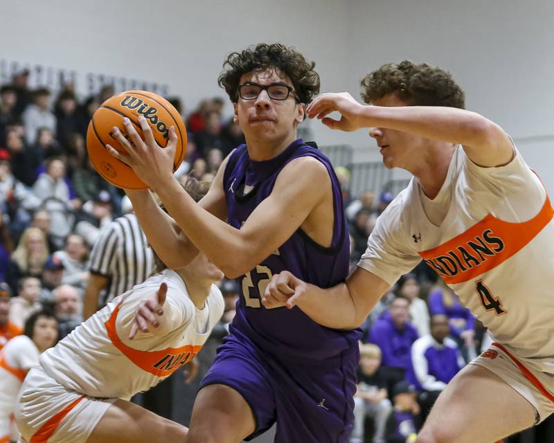 Plano's Jayden Zepeda (22) drives to the basket during their basketball game between Sandwich at Plano Tuesday, Jan 27, 2026 in Sandwich.