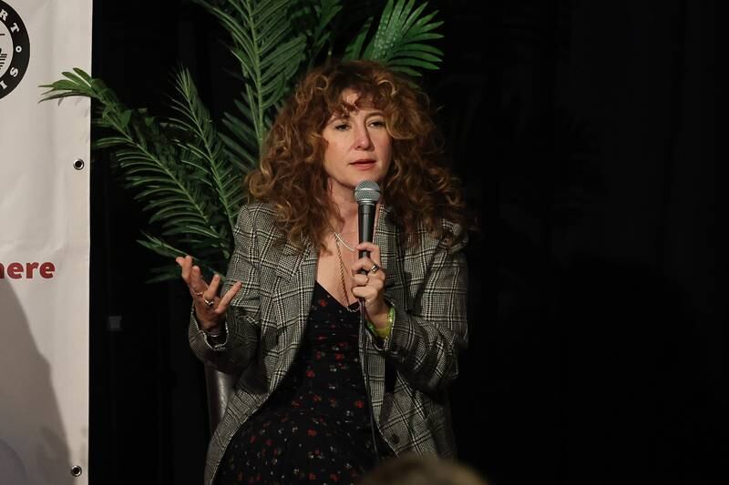 Co-creator Hannah Bos answers a question during a question and answer session at the HBO premiere of Somebody Somewhere at Roxy Lockport on Wednesday, Oct. 30, 2024 in Lockport.