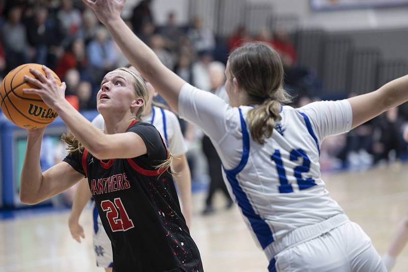 Erie-Prophetstown’s Aubrey Huisman puts up a shot against Newman’s Lucy Oetting Thursday, Jan. 29, 2026.
