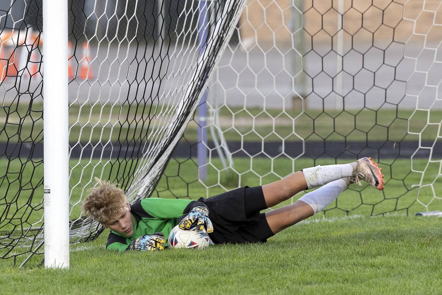 Winnebago goals Noah Melin stretches to make the stop Thursday, Sept. 26, 2024, at Dixon High School.