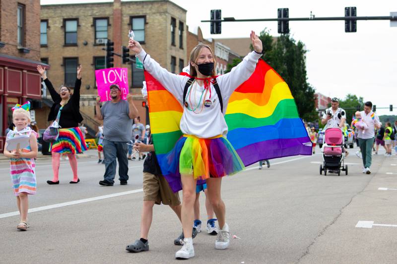 Parader holds Pride Flag in Ottawa Family Pride Fest on Saturday, June 8, 2024 at Jordan Block Park in Ottawa.