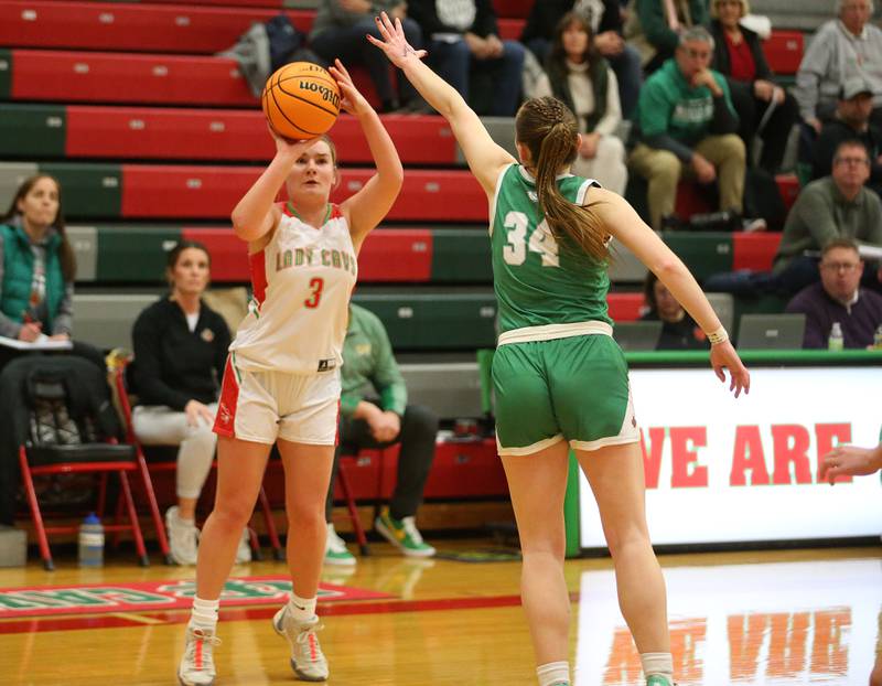 L-P's Emma Jereb takes a jump shot over Geneseo's Payton Snider on Tuesday, Feb. 4, 2025 in AJ Sellett Gymnasium at L-P High School.