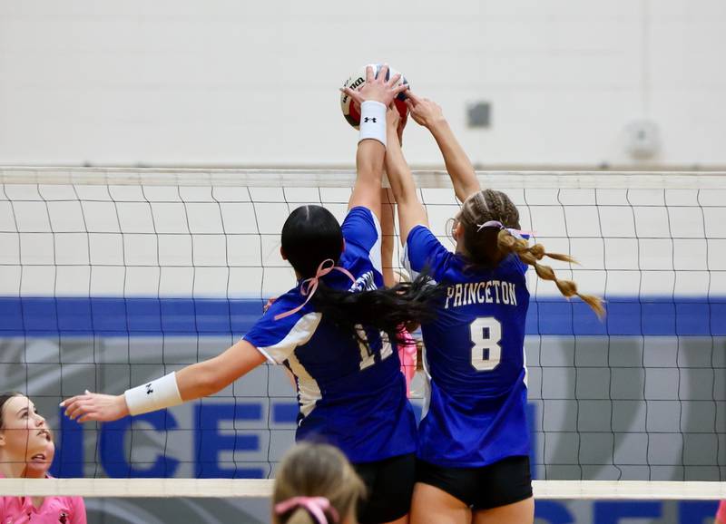 Princeton's Keely Lawson (left) and Keighley Davis team up fo a block against Hall Thursday night at Prouty Gym.