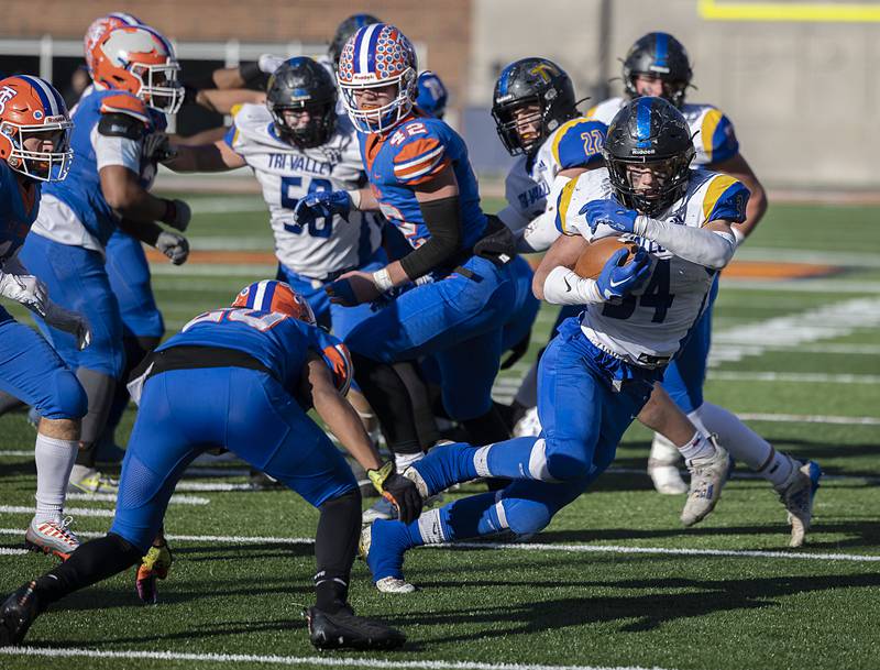 Tri-Valley’s Blake Regenold runs for yards against St. Teresa Decatur in the class 2A IHSA football state championship game Friday, Nov. 25, 2022.