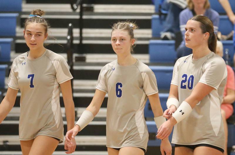 Princeton volleyball players (from left) Kathy Maciczak, Caroline Keutzer and Ellie Harp walk off of the floor after being defeated by El Paso-Gridley in the Class 2A Regional Semifinals on Tuesday, Oct. 29, 2024 at Fieldcrest High School.