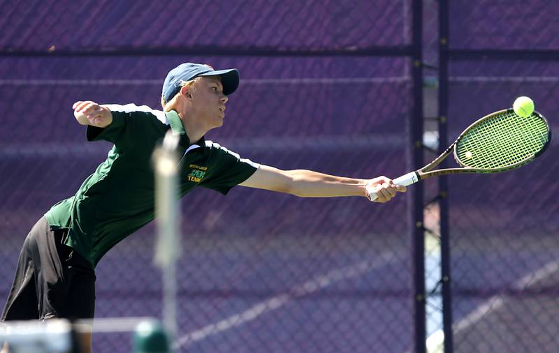 Crystal Lake South’s Jack Dacy returns the ball as he competes in the Class 1A Boys Doubles State Tennis Tournament on Thursday, May 23, 2024, at Rolling Meadows High School in Rolling Meadows.