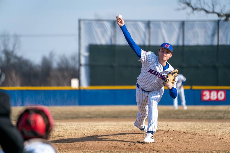 Marmion's Connor Tulley (9) delivers a pitch against Yorkville during a baseball game at Marmion High School in Aurora on Tuesday, Mar 28, 2023.