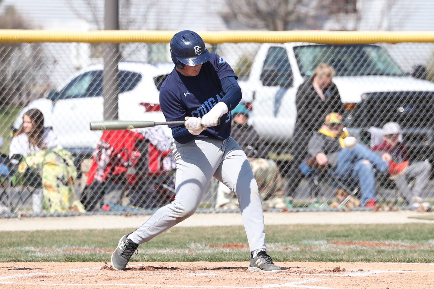 Plainfield South’s Daniel McCauley drives in a run against Plainfield North on Friday, April 7, 2023.