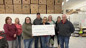 Ottawa/Marquette High School Class of 1984 donates $6,000 to Community Food Basket of Ottawa