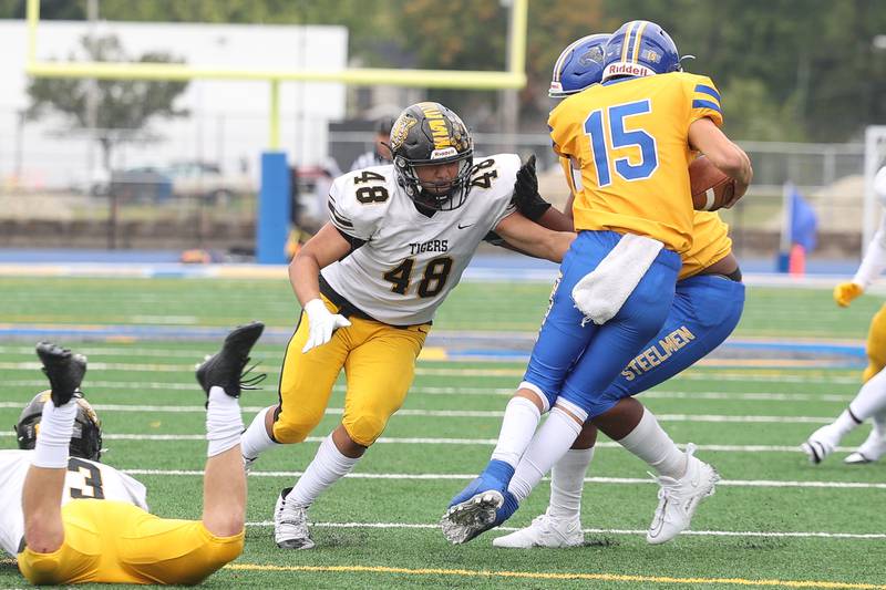 Joliet West’s Jesse Palomar looks to bring down Joliet Central’s Caleb Christos on Saturday, Sept. 28, 2024 in Joliet.