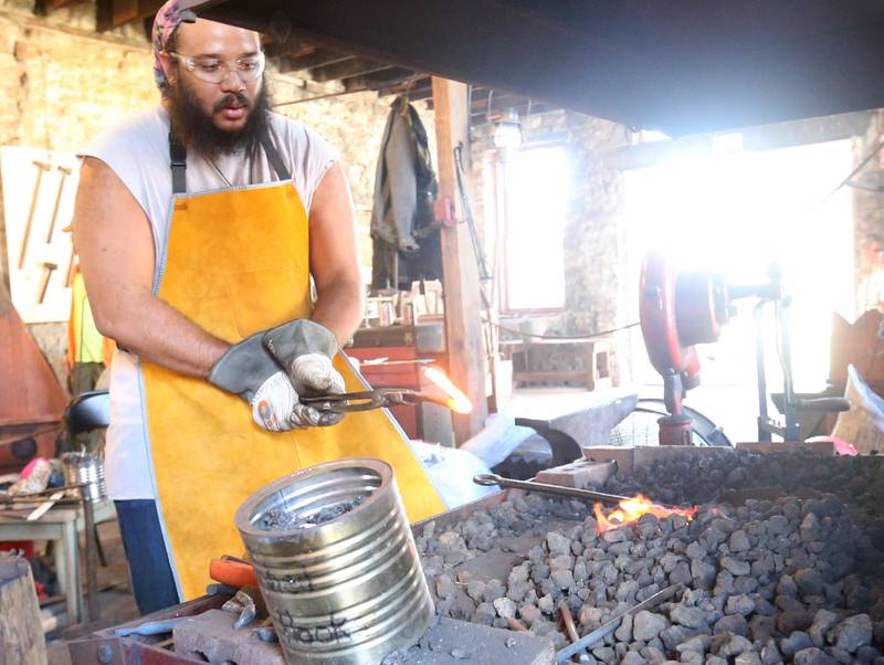 Koverick Hughes of Peru makes tools inside the Blacksmith Shop during the 55th annual Burgoo Festival on Sunday, Oct. 12, 2025 in Utica. The Blacksmith Shop is part of the La Salle County Historical Society campus.