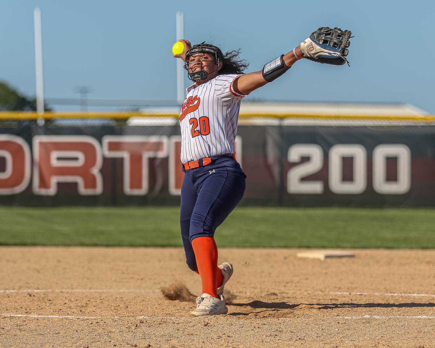 Oswego's Jaelynn Anthony (20) delivers a pitch during Class 4A Plainfield North Sectional semifinal softball game between Wheaton-Warrenville South at Oswego. May 29th, 2024.