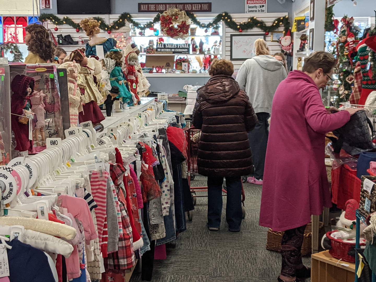 Thrift stores like Caring Hands Thrift Shop in Yorkville are seeing their fair share of holiday shoppers as people search for ways to cut costs.