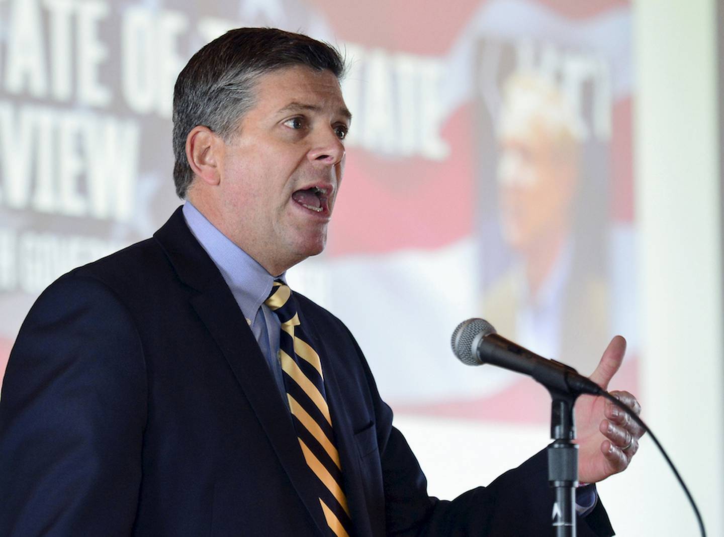 FILE - In this Feb. 6, 2015 file photo, Illinois state Sen. Darin LaHood, R-Dunlap, is seen at a Chamber of Commerce event in Peoria, Ill. LaHood, the son of former White House cabinet member and longtime Peoria U.S. Rep. Ray LaHood, remains the overwhelming favorite as the field takes shape for the race to replace ex-U.S. Rep. Aaron Schock. (AP Photo/Journal Star, Fred Zwicky, File)