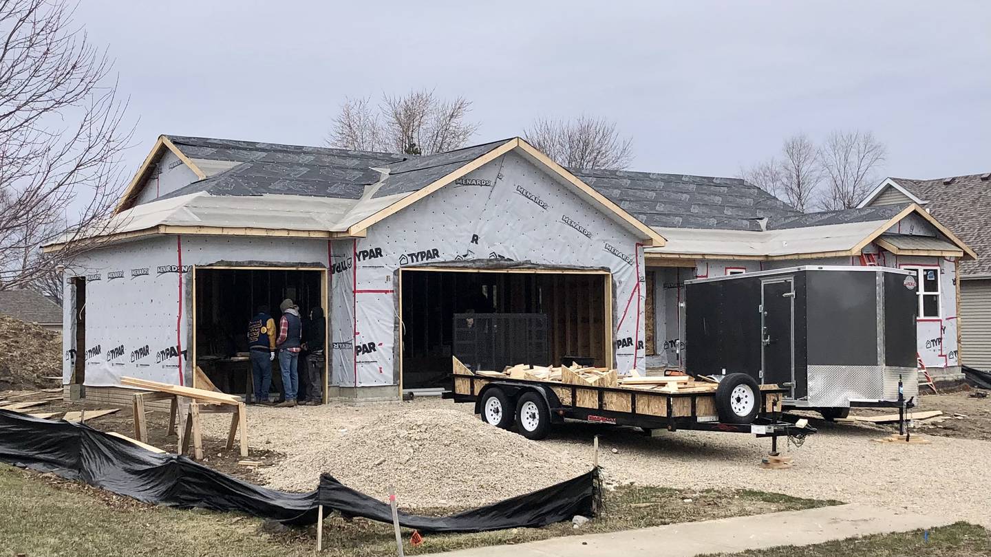 Area high school students working with the Indian Valley Vocational Center work on a house on Dutch Street Thursday, March 16, 2023 in Dutch Acres subdivision in Sandwich.