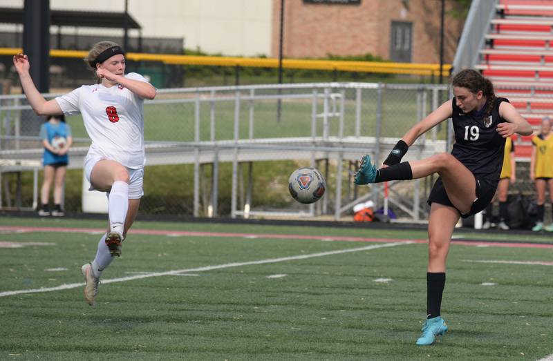 Downers Grove North's Addison Liszka defends the ball  during the regional final game against Glenbard East Friday May 20, 2022.