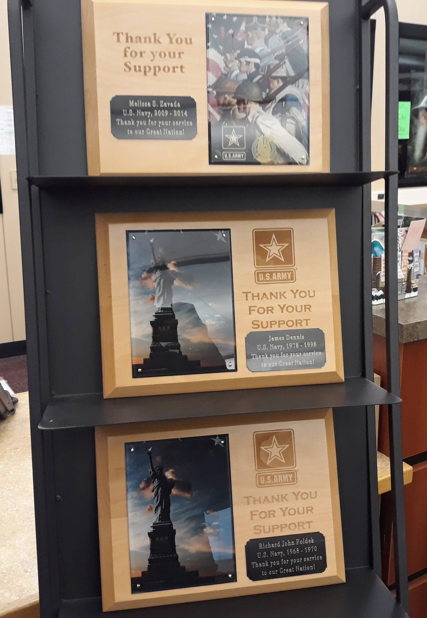 A sampling of the plaques presented to Streator High School staff who have served in the military.