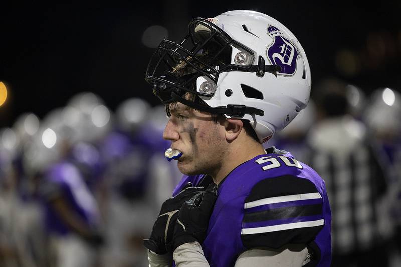 Dixon’s Aidan Howard watches intently their game against Chicago Ag Science Friday, Nov. 8, 2024 in the second round of the Class 4A football playoffs.