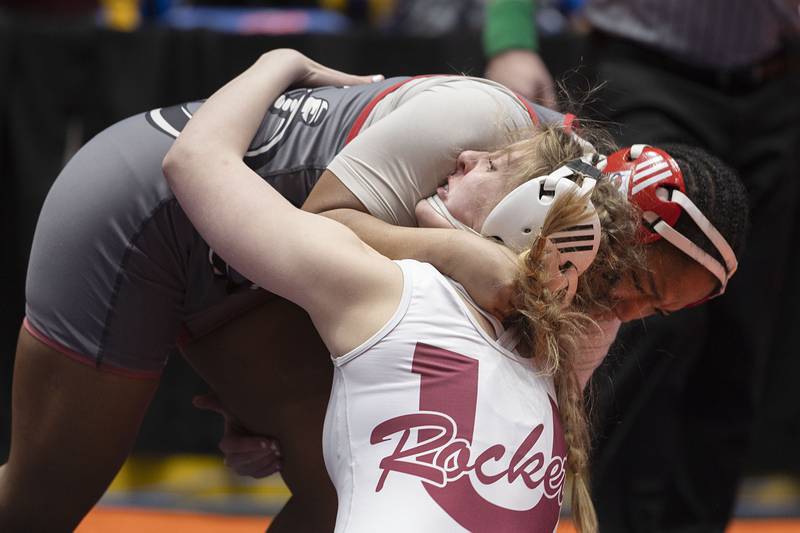 Jasmine Hernandez of Palatine (top) grapples with Lexi Ritchie of Unity in the 155 pound third place match at the IHSA girls state wrestling championship Saturday, Feb. 25, 2023.
