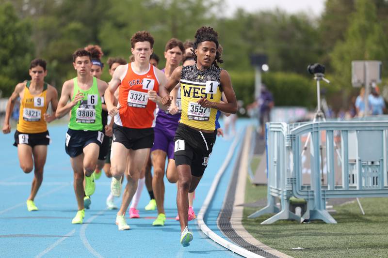 Joliet West’s Marcellus Mines holds a slight lead midway in the Class 3A 1600 Meter Run State Finals on Saturday, May 27, 2023 in Charleston.