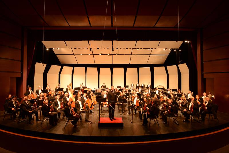 The celebrated Elgin Symphony Orchestra, shown at its home theater, will be the guest artist for a festive holiday performance in Crystal Lake.