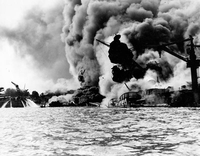 The USS Arizona was hit by several bombs during the Japanese attack on Pearl Harbor on Dec. 7, 1941. The battleship sunk, killing 1,177 of its officers and crewmen.