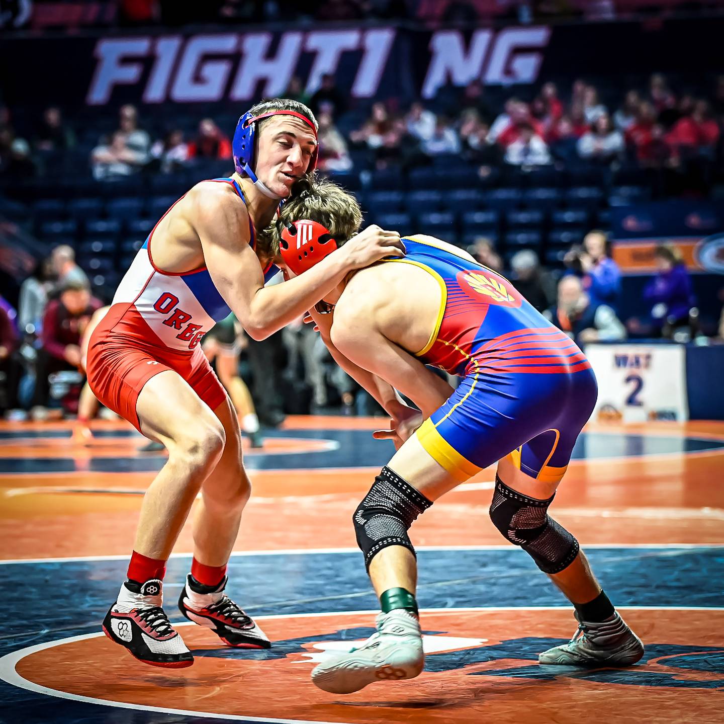 Oregon's Nelson Benesh (left) wrestles at the 1A state individual meet in Champaign on Friday, Feb. 21, 2025.
