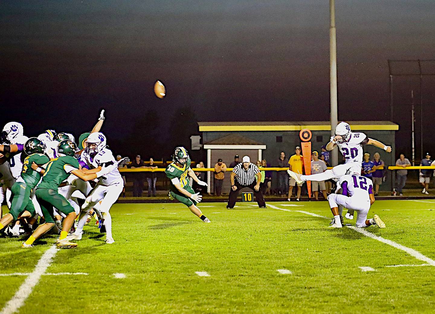 Wilmington's Allan Richards kicks a 20-yard field goal in a 10-7 win over Coal City last season.