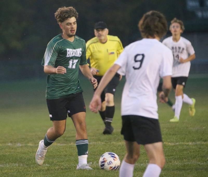 St. Bede's Mark Rudenko kicks the ball past Abingdon-Avon's Brody Redfern on Wednesday, Oct. 15, 2025 at St. Bede Academy.