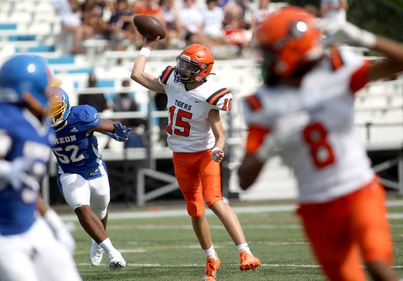 Wheaton Warrenville South quarterback Luca Carbonaro throws the ball during a game against Simeon at Gately Stadium in Chicago on Saturday, Aug. 27, 2022.