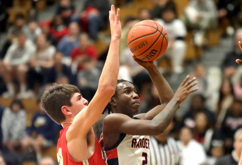 Bolingbrook’s DJ Strong shoots the ball during the Jack Tosh Holiday Classic semifinals against Palatine at York High School in Elmhurst on Friday, Dec. 29, 2023.