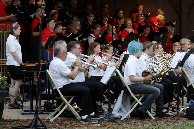 Members of the Crystal Lake Community Band and Voices in Harmony perform before the fireworks show Sunday, July 2, 2023, at Crystal Lake’s Main Beach during Crystal Lake Annual Independence Day Celebration.