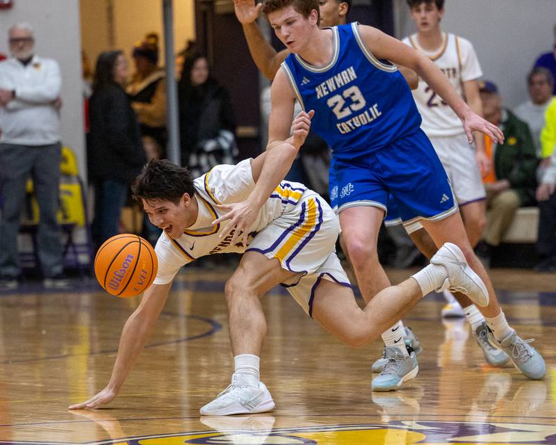 Mendota's Cayden Taliani (12) pursues loose ball in game against Newman Central Catholic on Friday, January 30, 2026 at Mendota High School in Mendota.