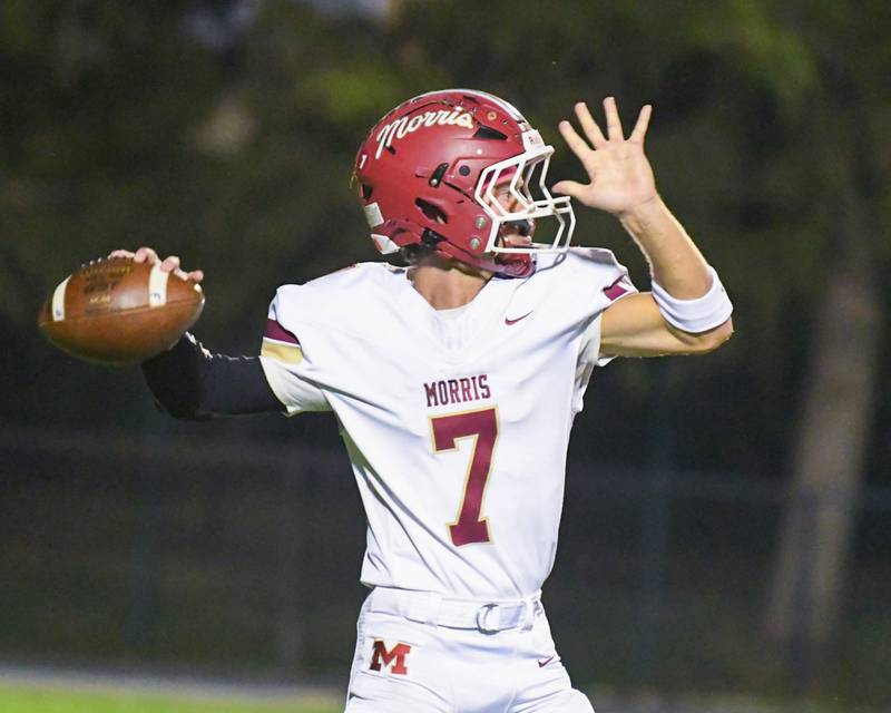 Morris's Brady Varner (7) throws for a deep pass during the game on Friday Sept. 26, 2025, while traveling to take on Kaneland High School.