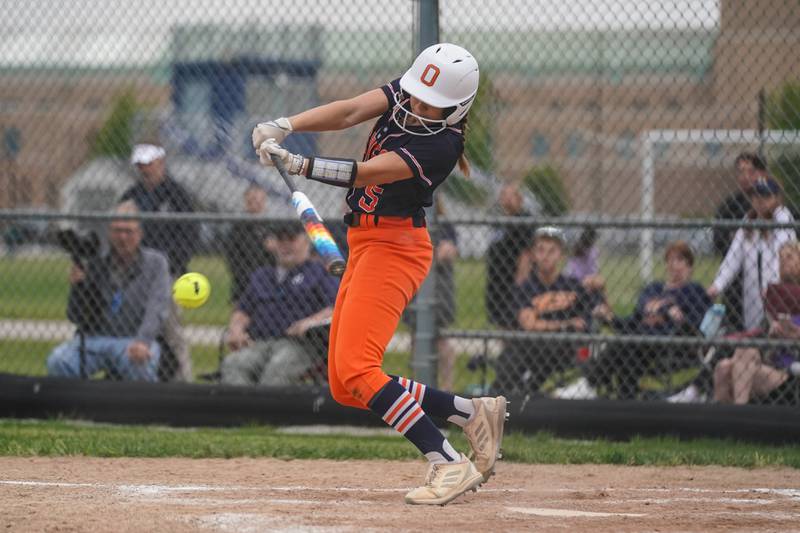 Oswego’s Adalynn Fugitt (5) hits a slap single against Neuqua Valley during a Class 4A Oswego East Regional Final softball game at Oswego East High School on Friday, May 30, 2025.
