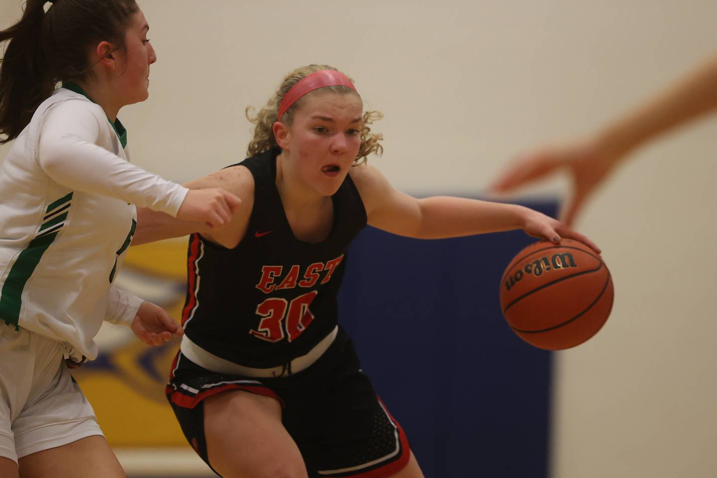 Glenbard East’s Catey Carney makes a move against Providence in the 2022 Carl Sandburg Girls Basketball Holiday Classic.