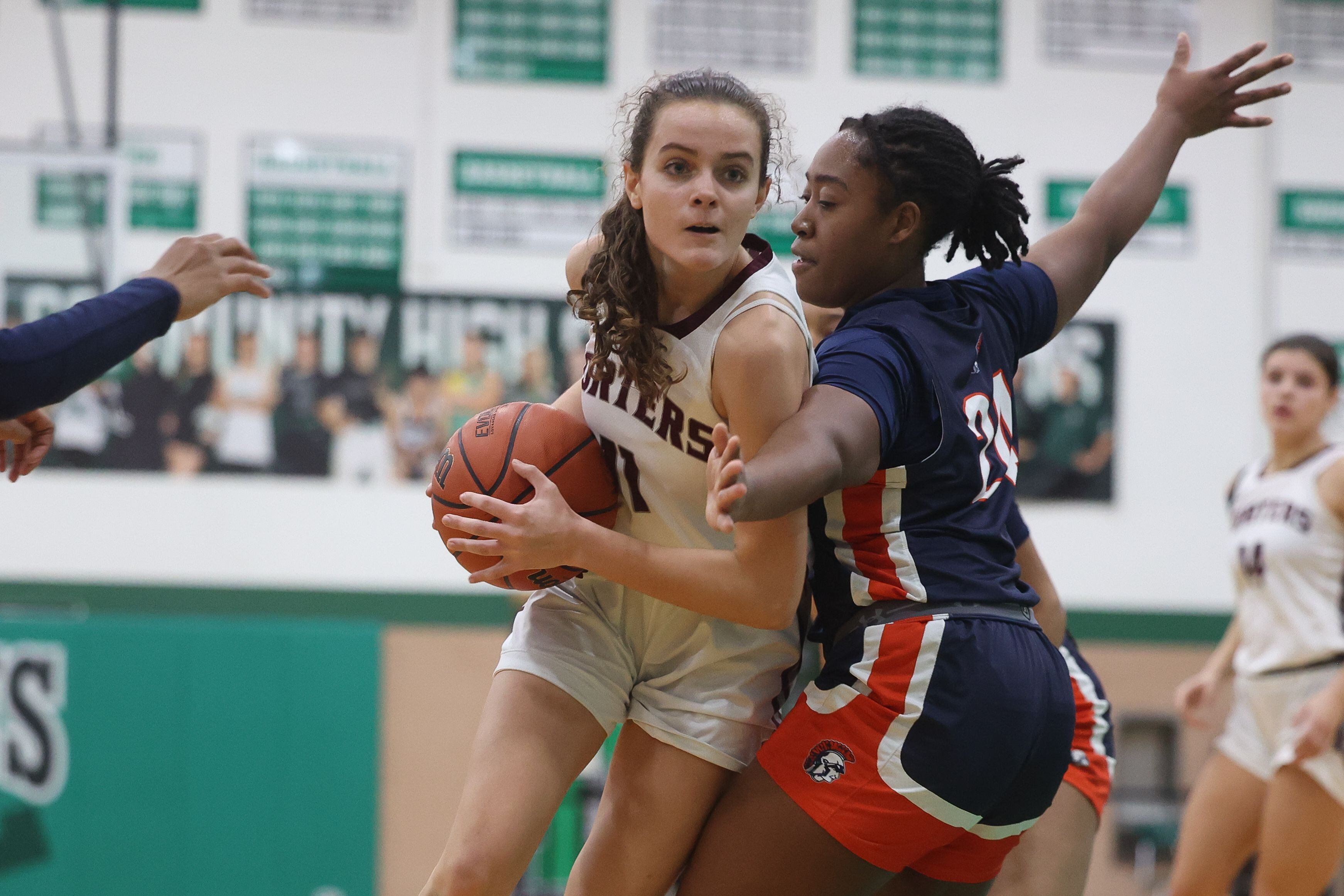 Lockport’s Laura Arstikaitis drives past Romeoville’s Laila Houseworth in the Oak Lawn Holiday Tournament championship on Saturday, Dec.16th in Oak Lawn.