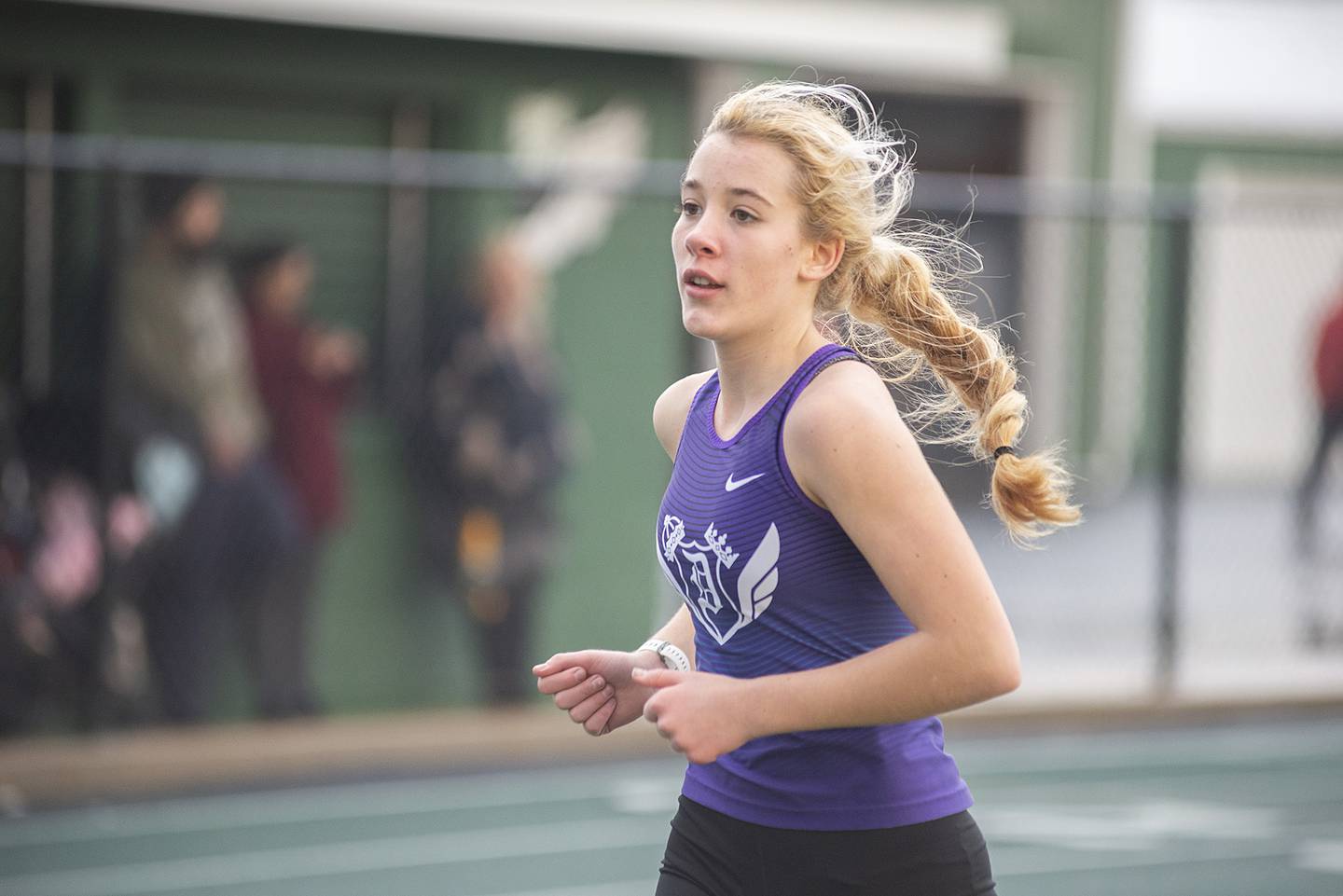 Dixon's Emma Smith runs the 3200 Friday, April 22, 2022 at the Rock Falls track invitational.