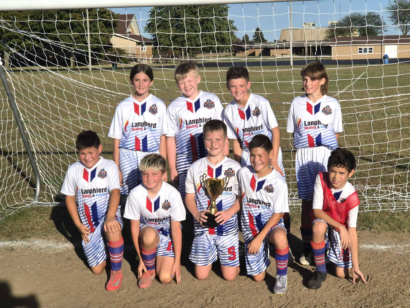 Ottawa Soccer Club's U12 city champions are Lanphierd Heating and Cooling.