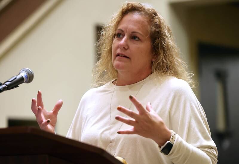 Jennifer Yochem of the DeKalb County Housing Authority speaks Monday, Oct. 3, 2022, at the Egyptian Theatre during the Safe Passage domestic violence vigil.