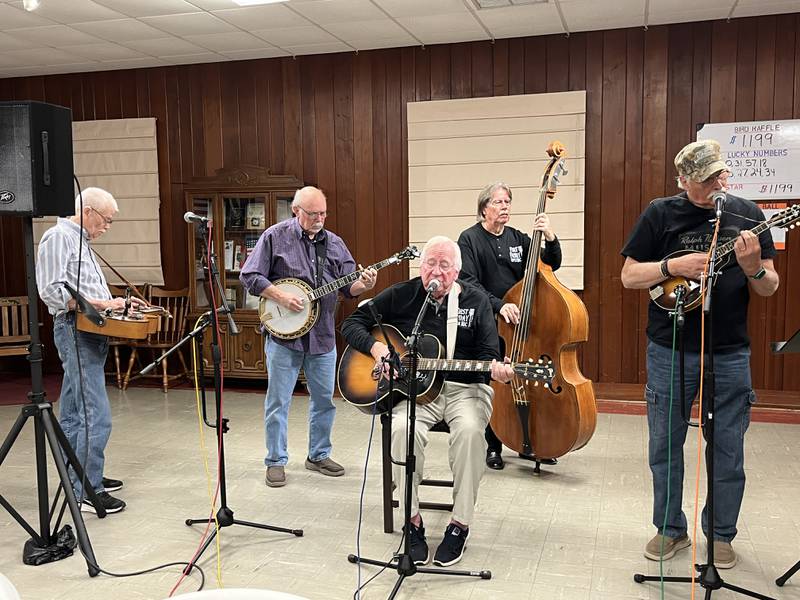 Jerry Tice was accompanied at last month's First Fridays by Larry Wallace on dobro, Tim Laurence on banjo, Mike Bratt on bass, and John Lindblade on guitar.