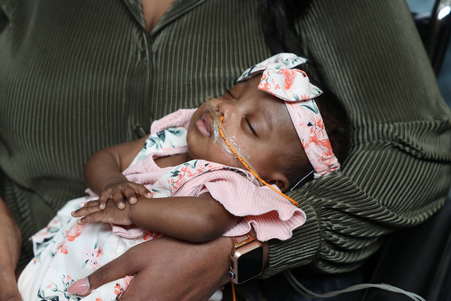 Nakeya Haywood holds her daughter Nyla during a send off party at Silver Cross Hospital on Monday, May 13, 2024 in New Lenox. Nyla is the youngest preemie, born Nov. 17, 2023, at 22 weeks and 3 days, weighing 1.1 pounds, Silver Cross Hospital’s NICU has cared for.