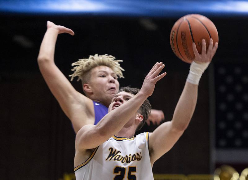 Sterling’s Kael Ryan puts up a shot against Rochelle Tuesday, Jan. 31, 2023.