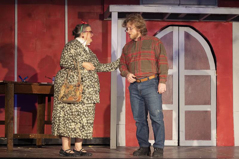 Alice, played by Kristin DuBois, and Mack, played by Micah Green, have a conversation during rehearsal for Polo Area Community Theatre’s rendition of “Fruitcakes.”
