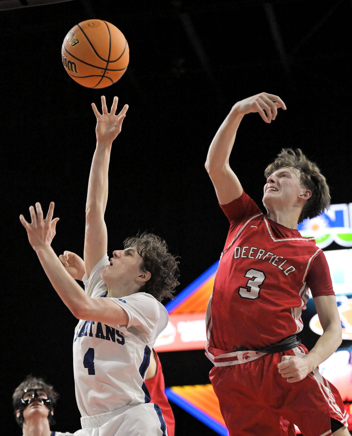 Deerfield’s Charlie Yellen strips the ball from St. Francis’ Johnny Shannon in the IHSA Class 3A supersectional championship game at the Now Arena in Hoffman Estates on Monday, Mar. 9 2026.